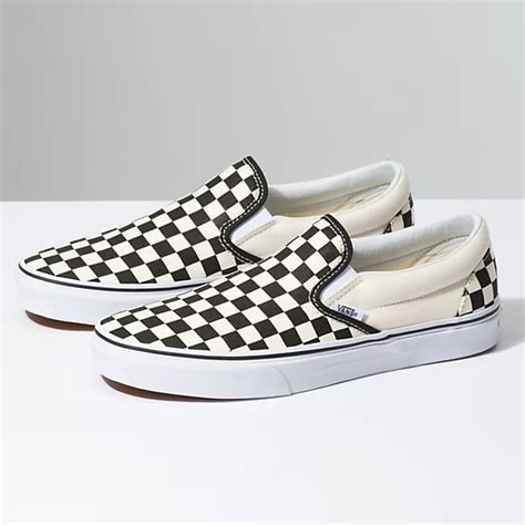 checkerboard vans slip on.